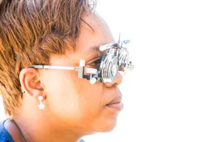 Woman wearing opticians test glasses