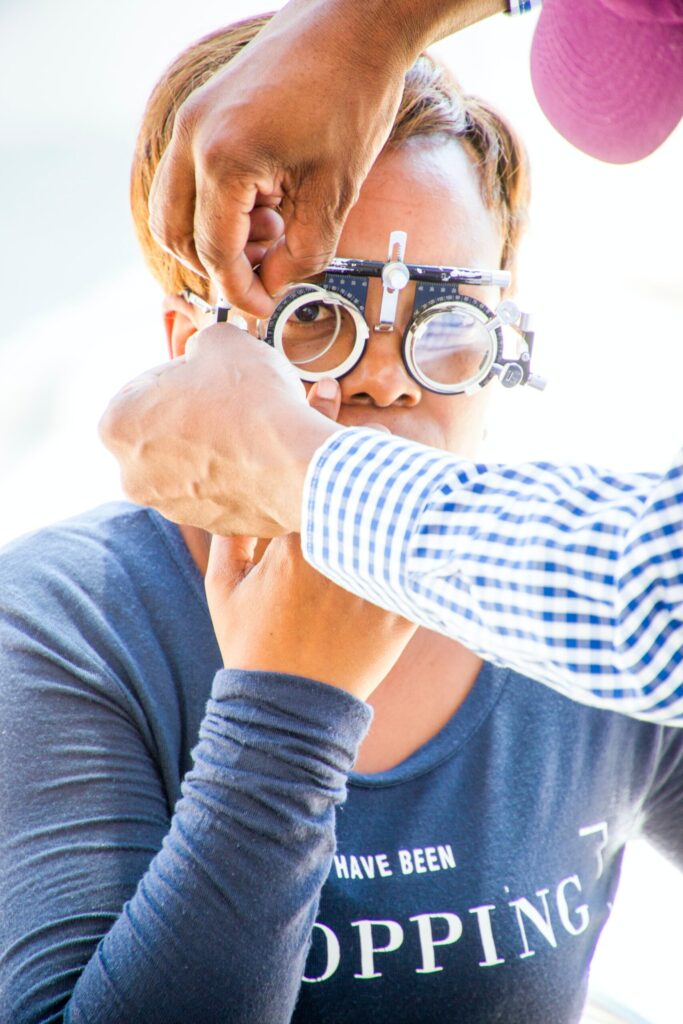 Glasses lens test being administered to patient