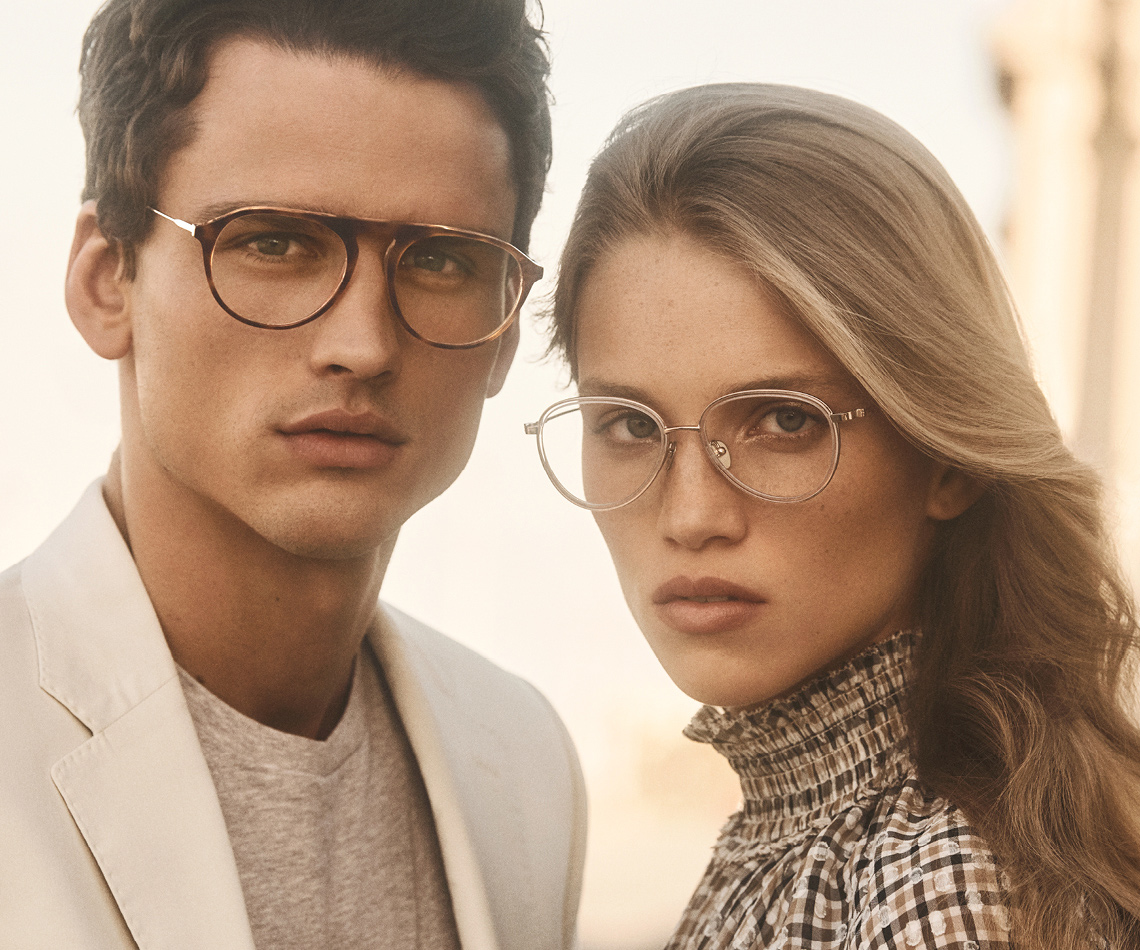 Couple wearing Calvin Klein glasses and looking into the camera