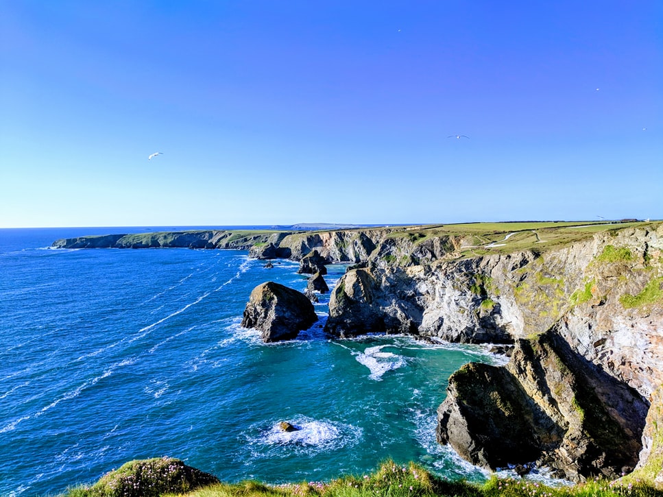 View across sunny Cornish cliffs