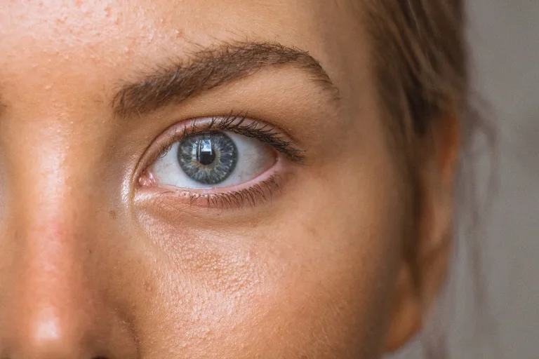Close up of a Woman's eye with grey iris