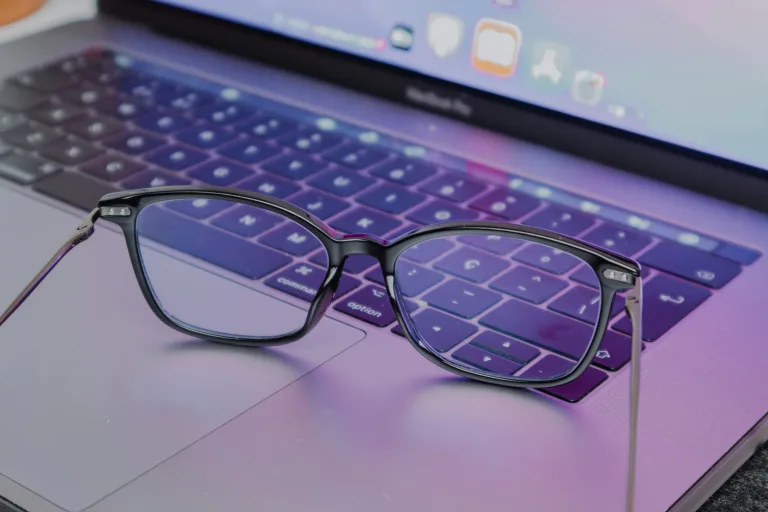 glasses on laptop keyboard